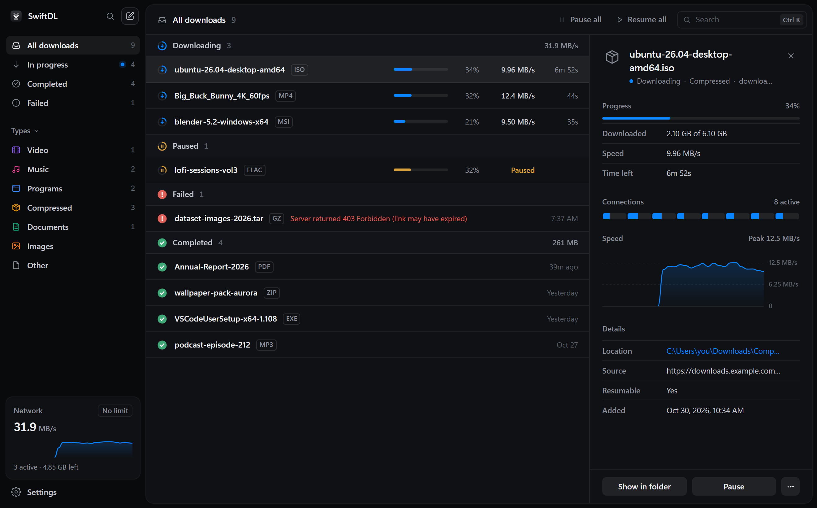 SwiftDL main window with downloads grouped by status, live speed and a detail panel